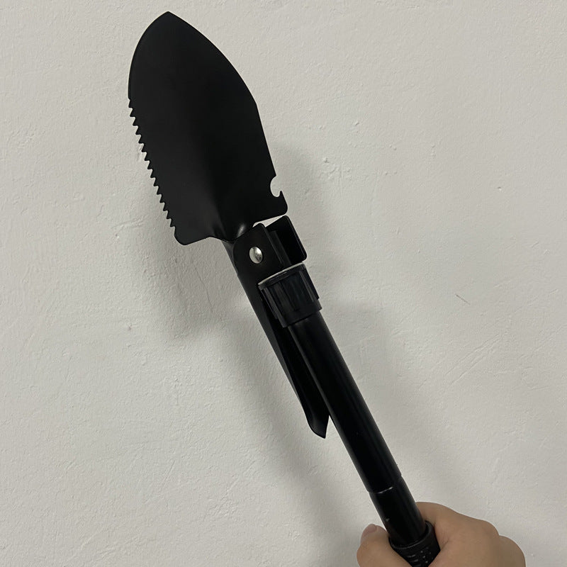Multi-functional folding entrenching shovel